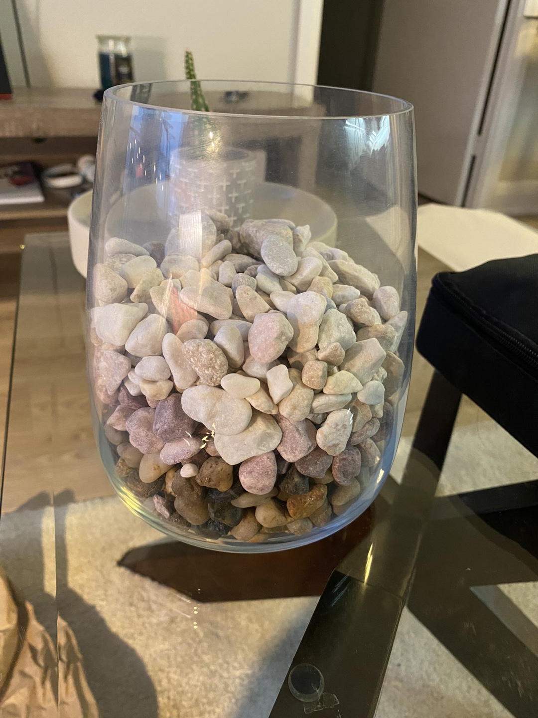 Glass vase with rocks