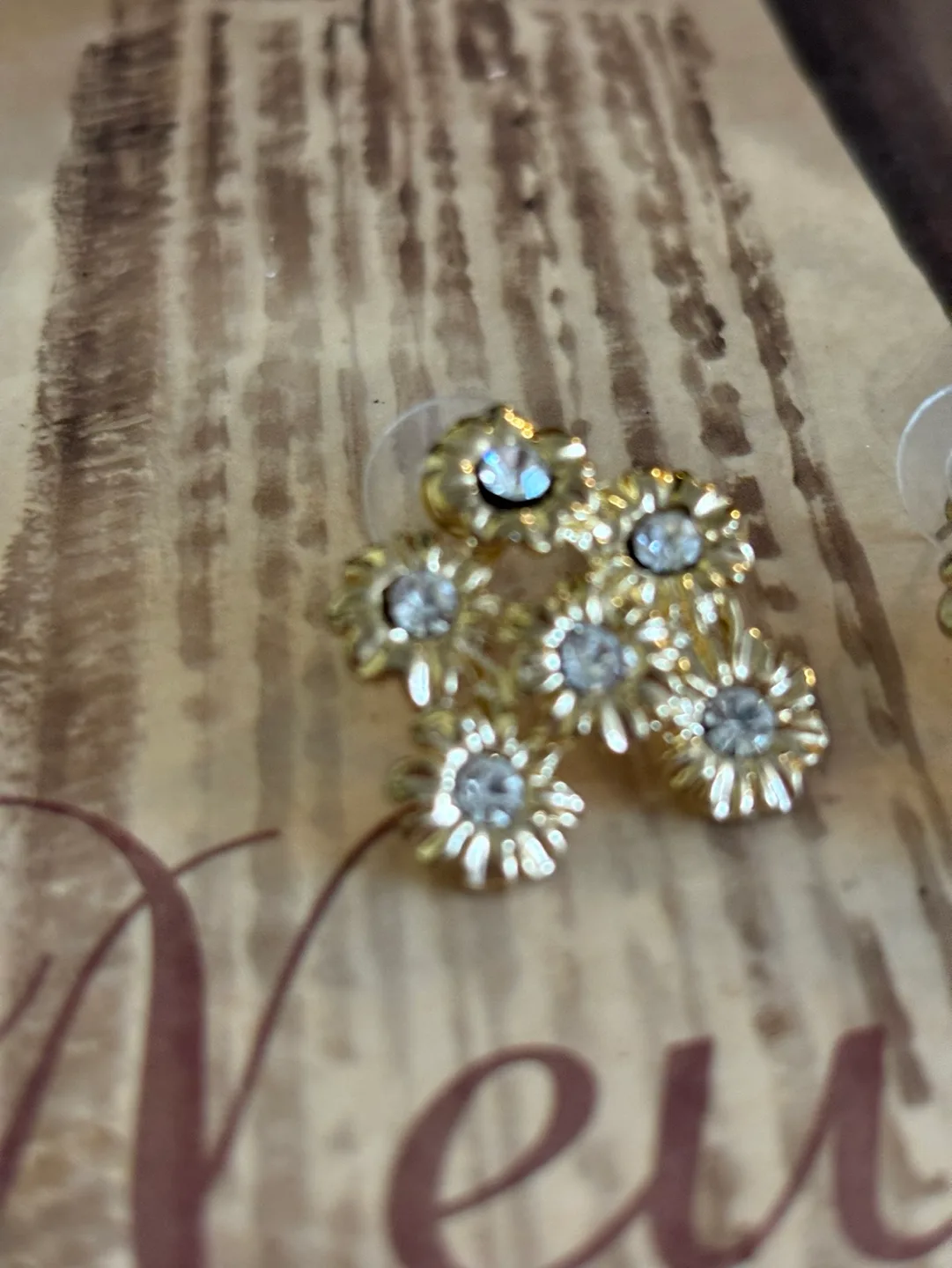 Gold Tone Flower Stud Earrings with crystals image indicator(4)