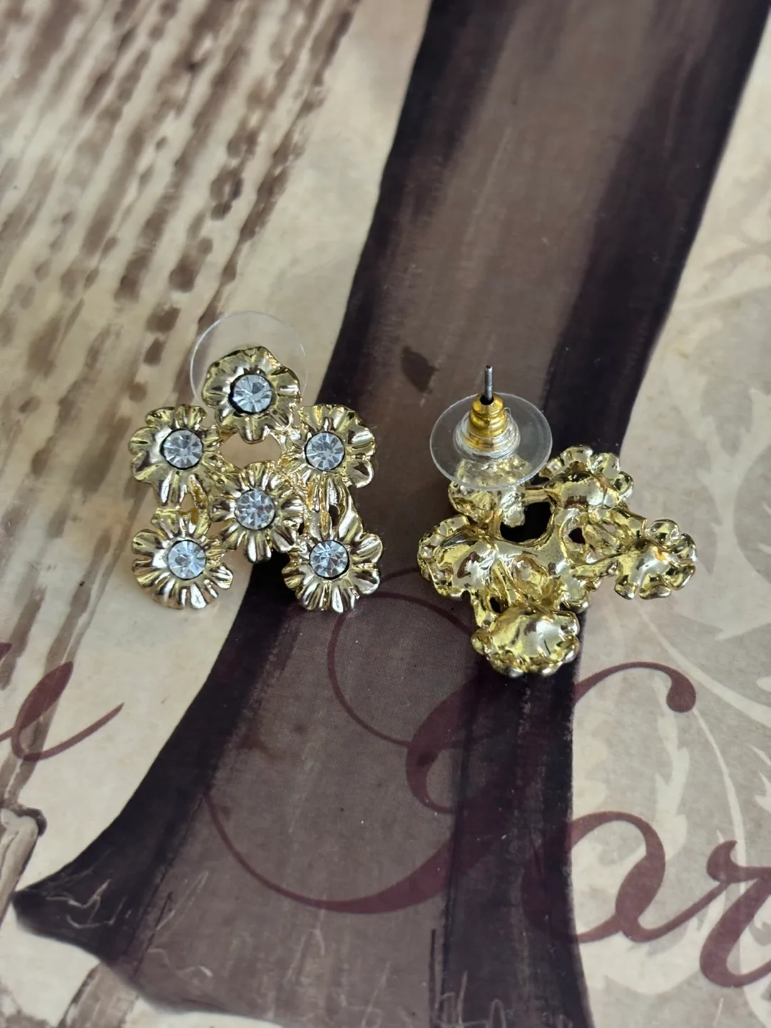 Gold Tone Flower Stud Earrings with crystals image indicator(3)
