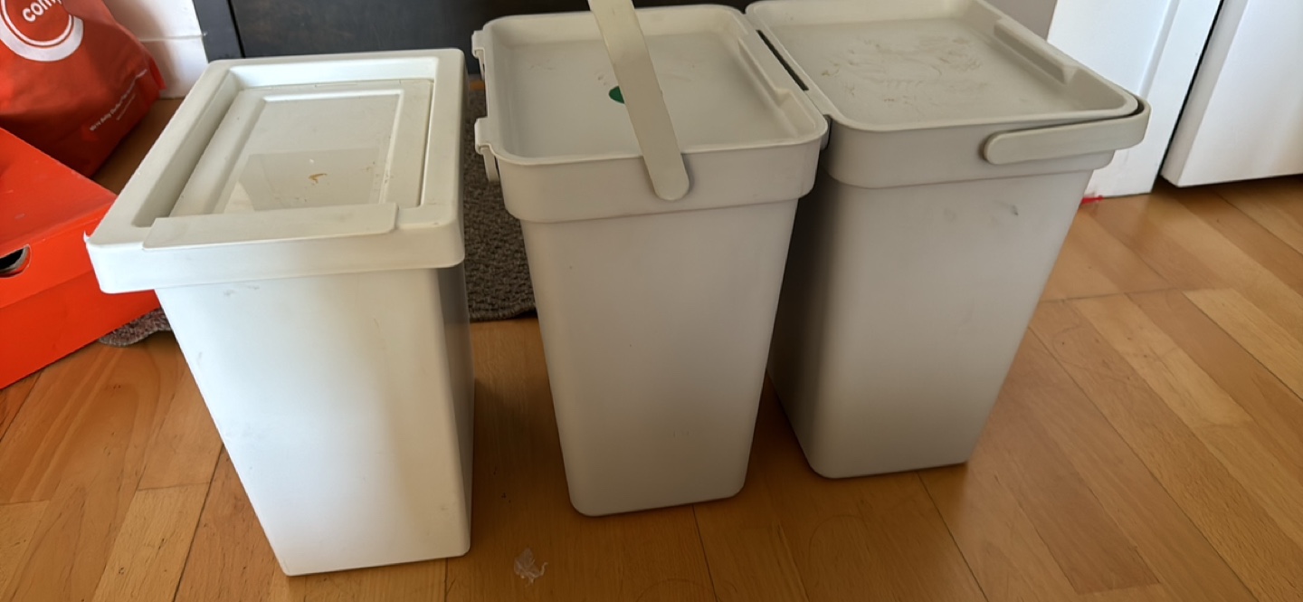 Three White Storage Bins