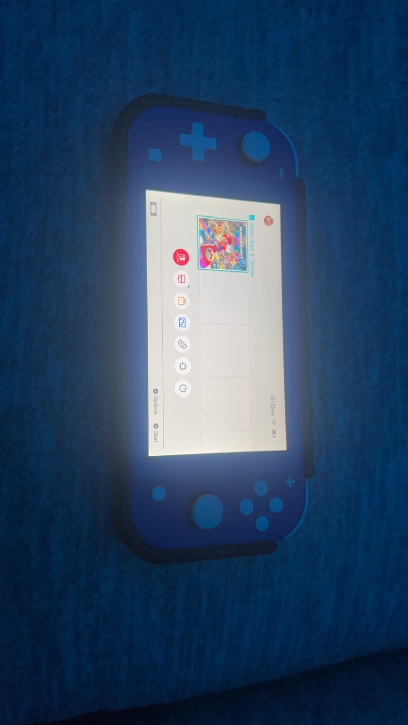 Nintendo Switch lite with Mario cart and will add a controller - photo 2