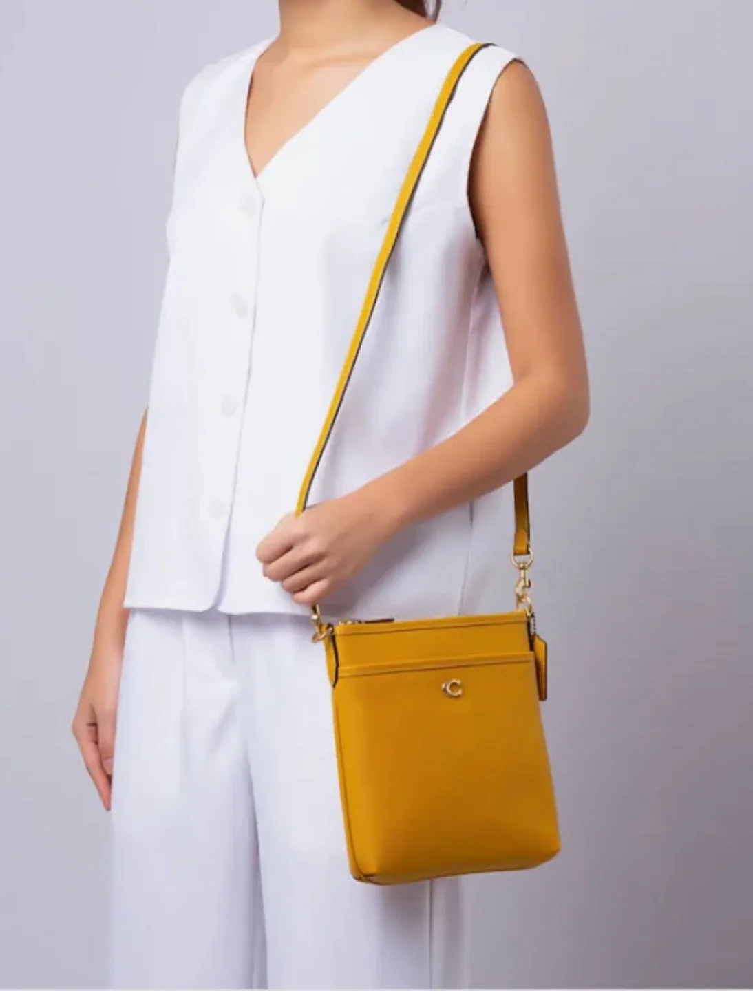 Yellow Coach Kitt Messenger crossbody bag image indicator(5)