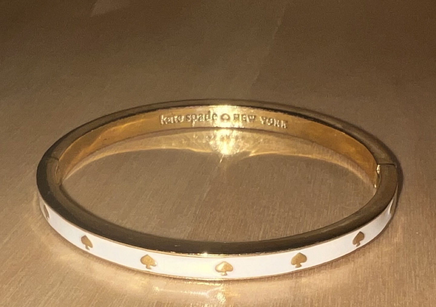 Kate Spade Gold and White Enamel Bangle Bracelet
