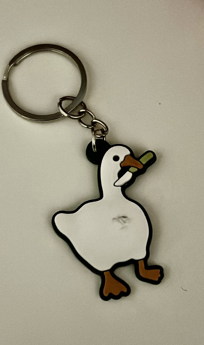 Duck with Knife Rubber Keychain