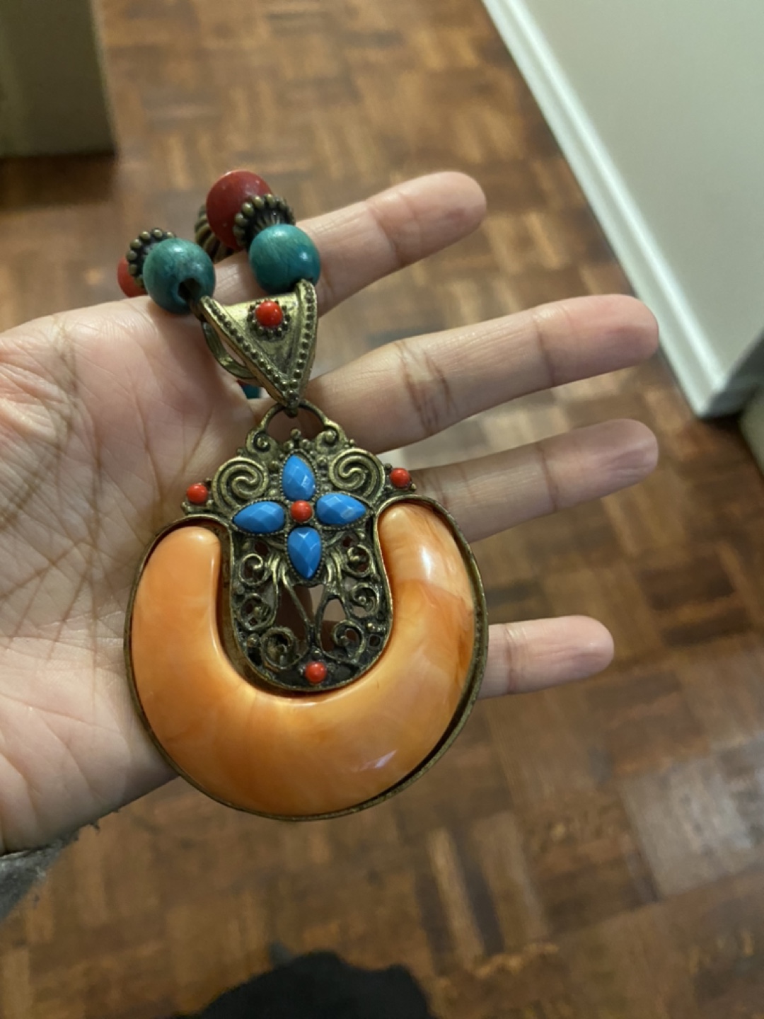 Beaded necklace with large pendant