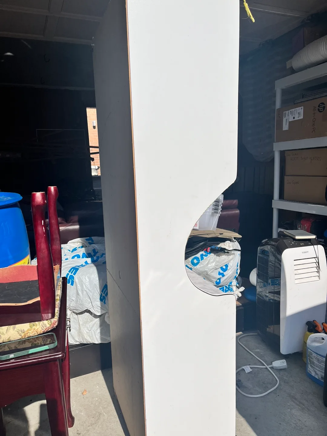 White cabinet with glass doors and marble-look top image indicator(4)