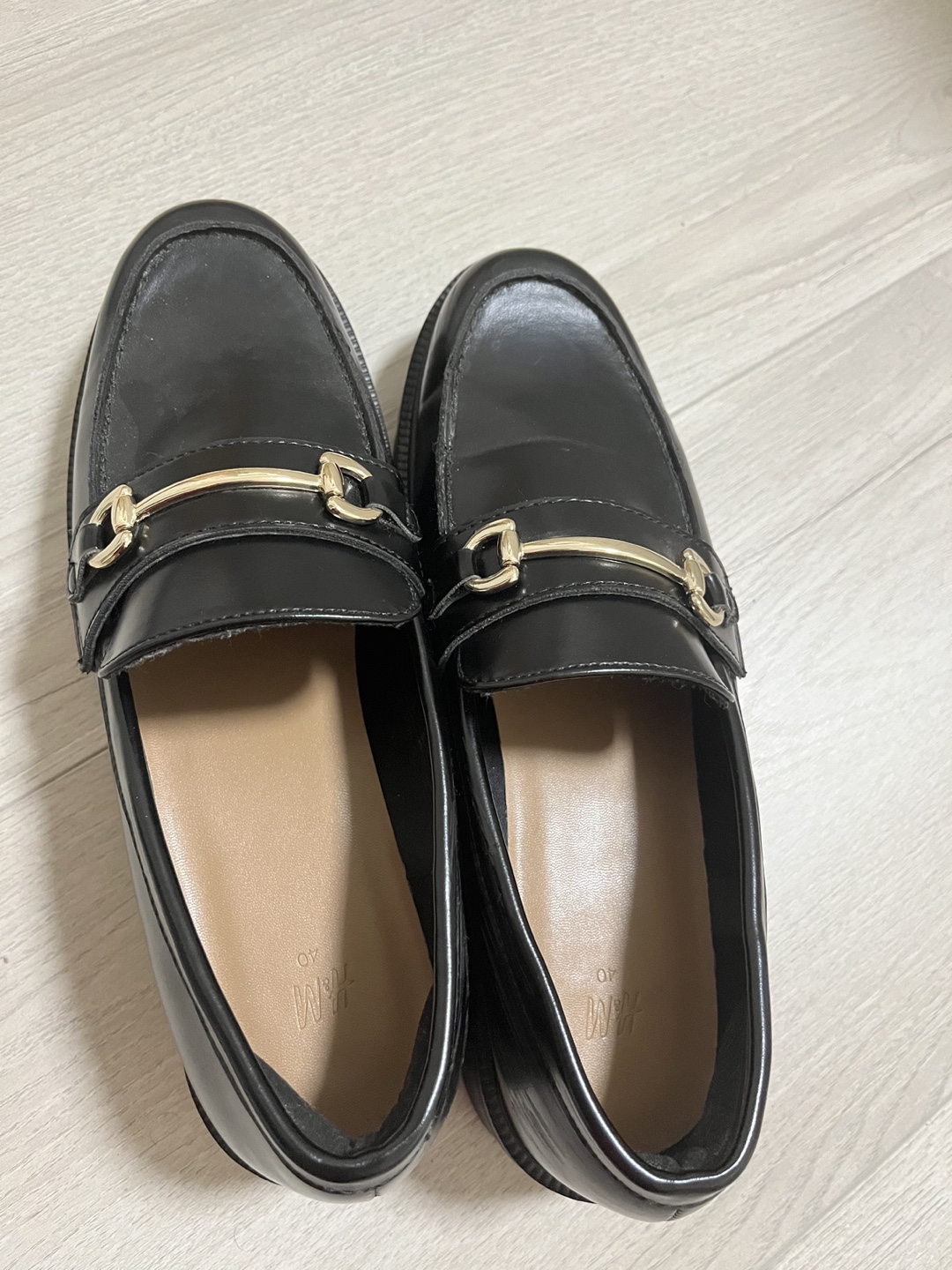 H&M Black loafers with gold buckle