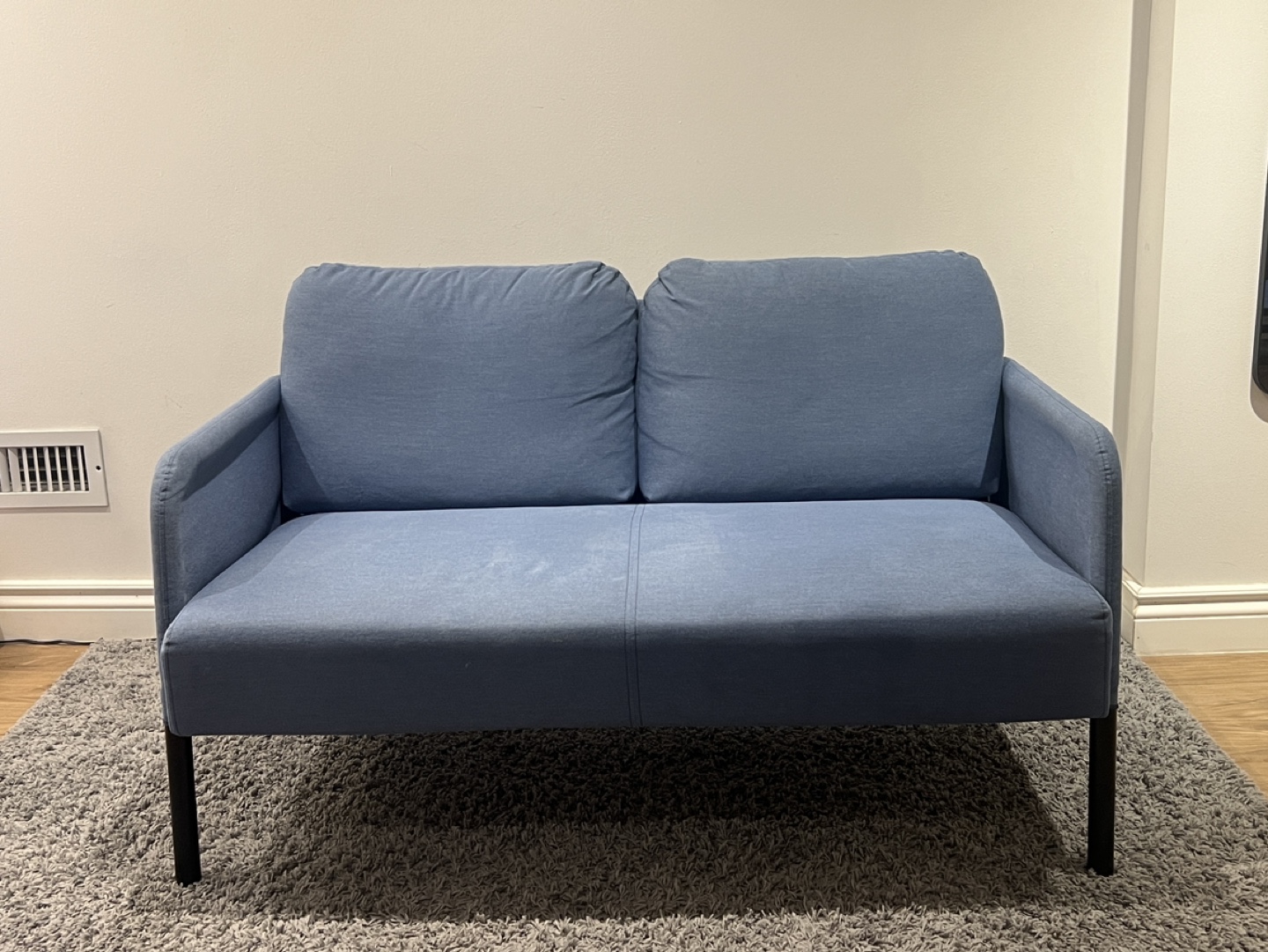 Blue loveseat couch