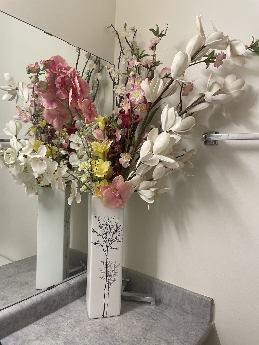 White Ceramic Vase with Floral Arrangement