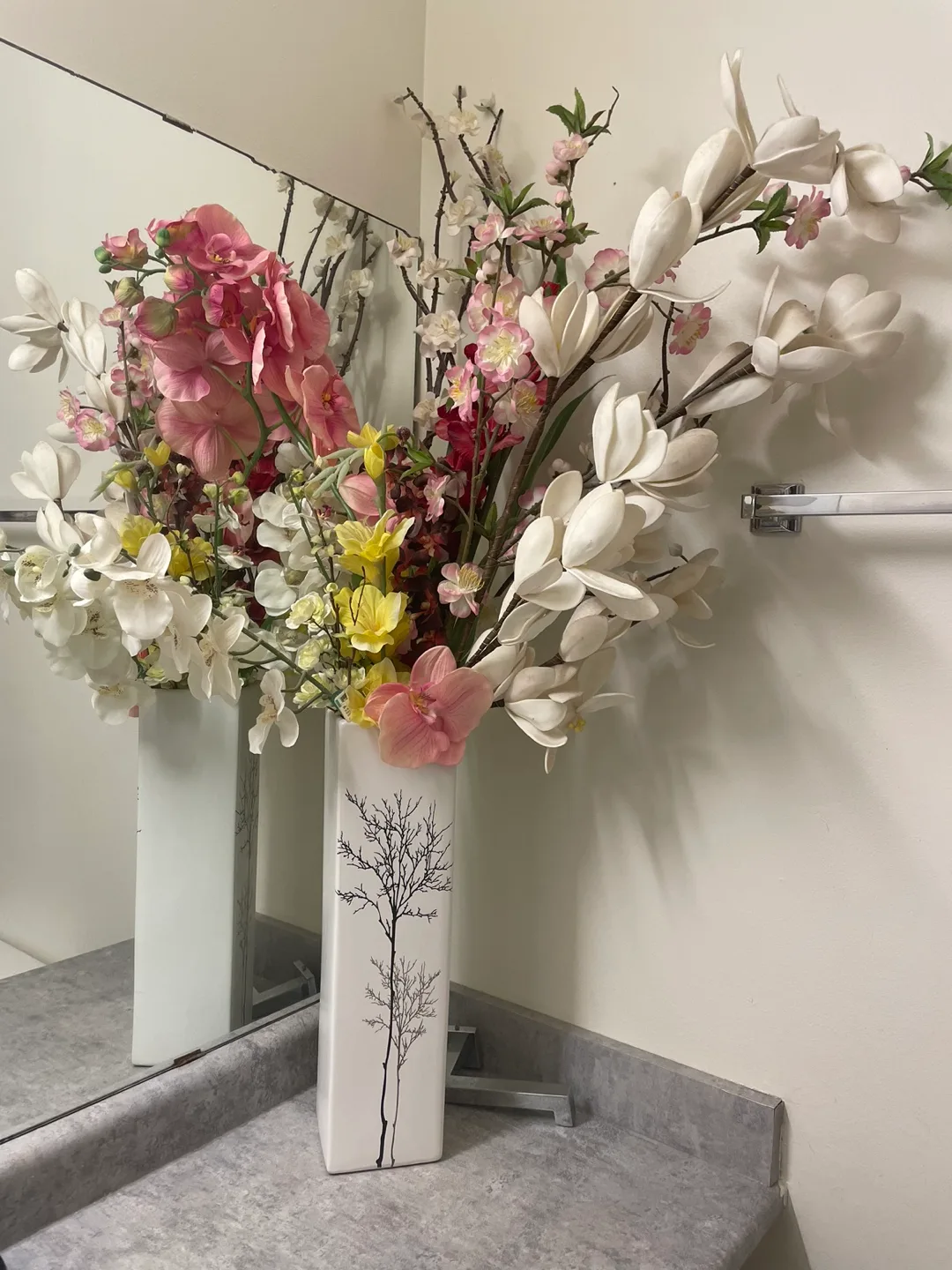White Ceramic Vase with Floral Arrangement thumbnail