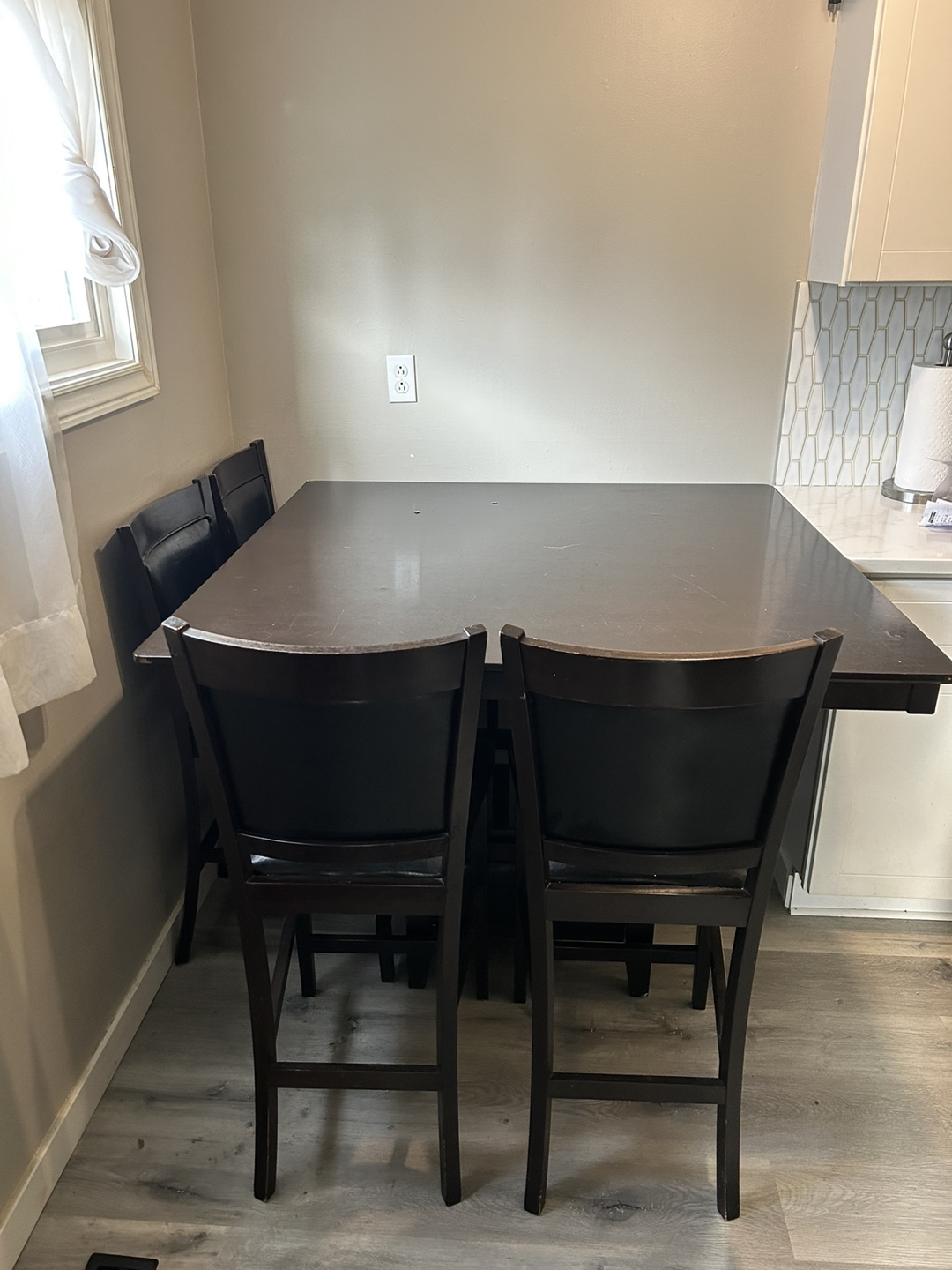 Square dining table set with four chairs