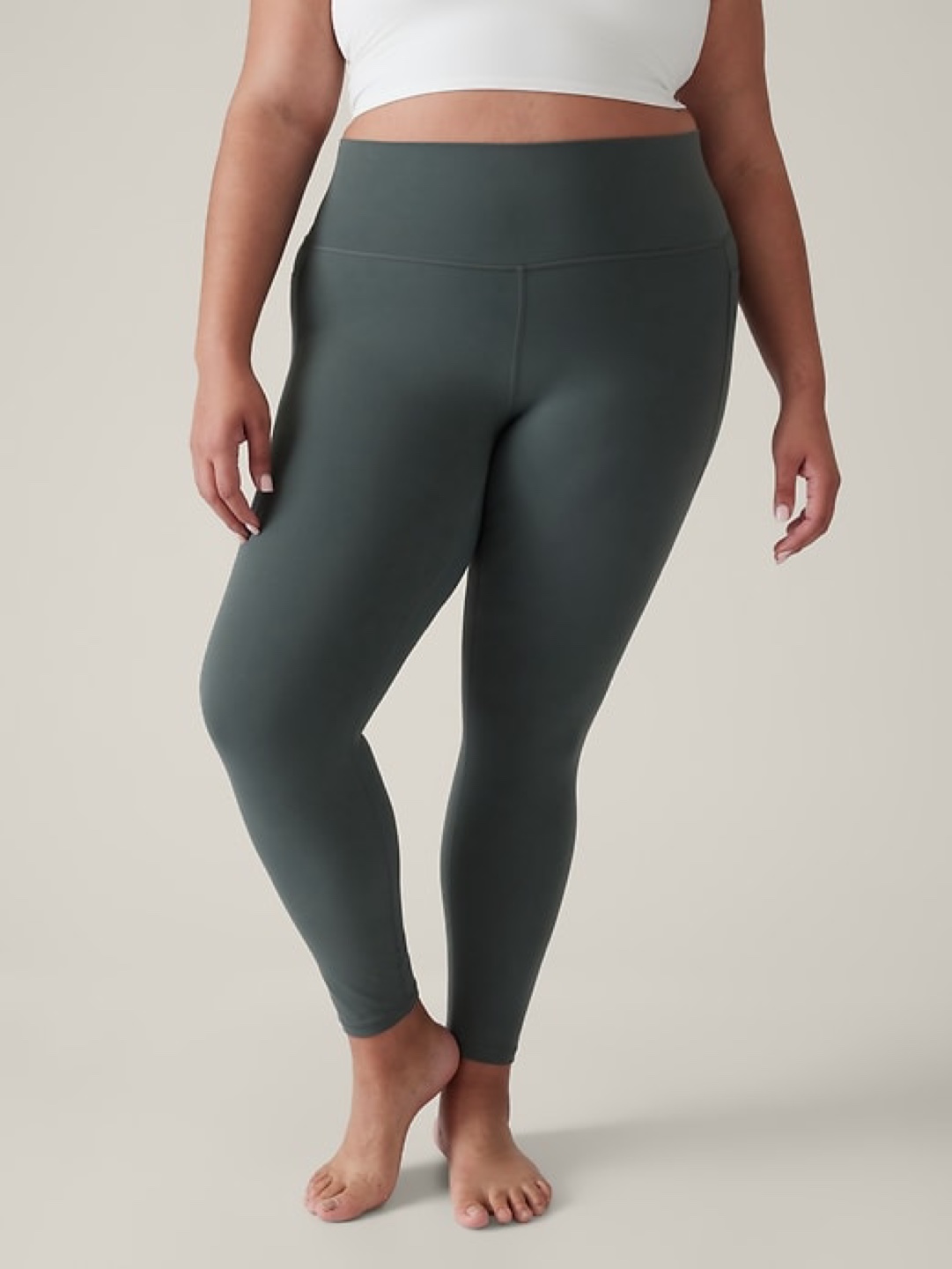 Athleta Transcend Stash Tight in Bali Green