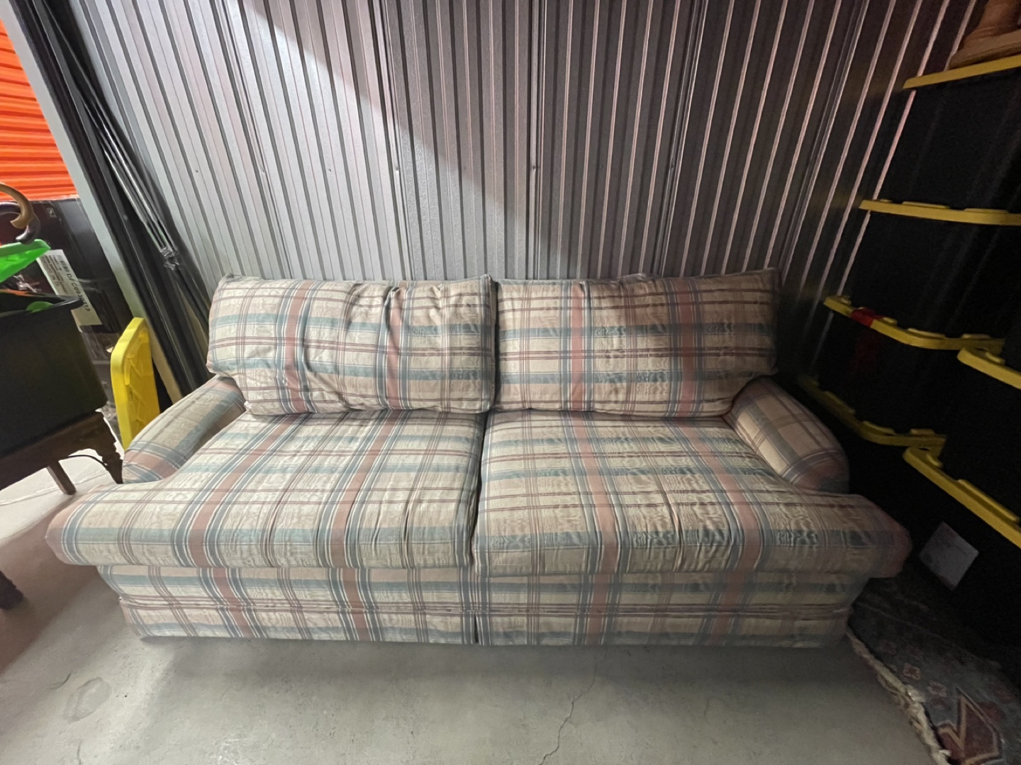 Sofa with plaid fabric