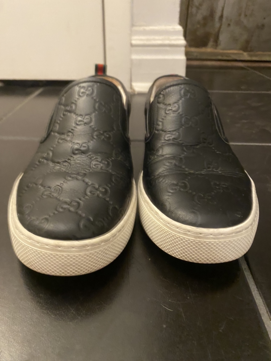 Gucci Black Leather GG Slip-On Sneakers