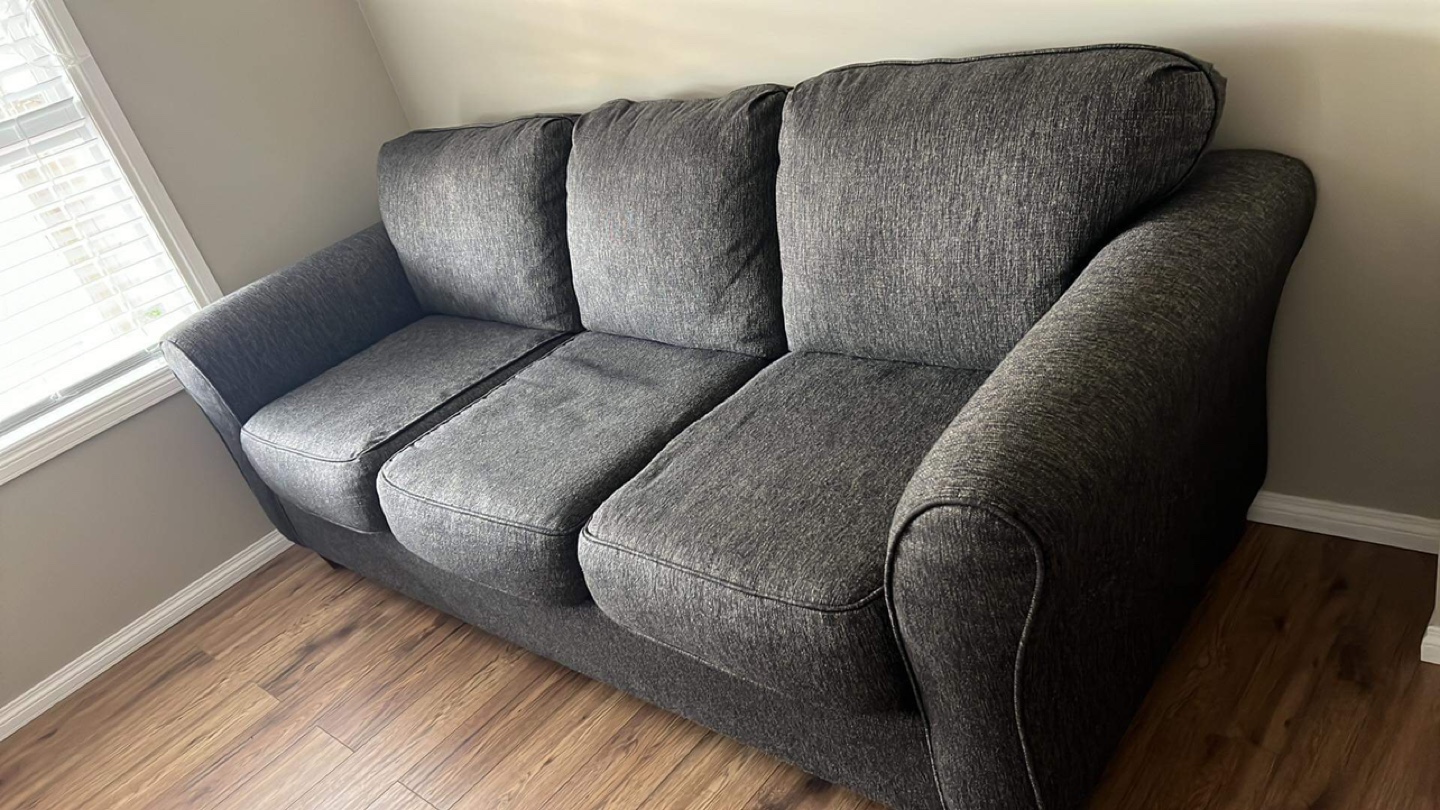 Three seated Grey Sofa with cover- moving sell - photo 2