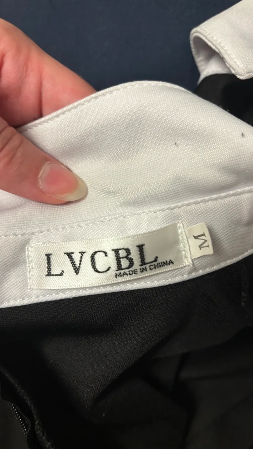 Black Dress with White Collar and Cuffs image indicator(3)