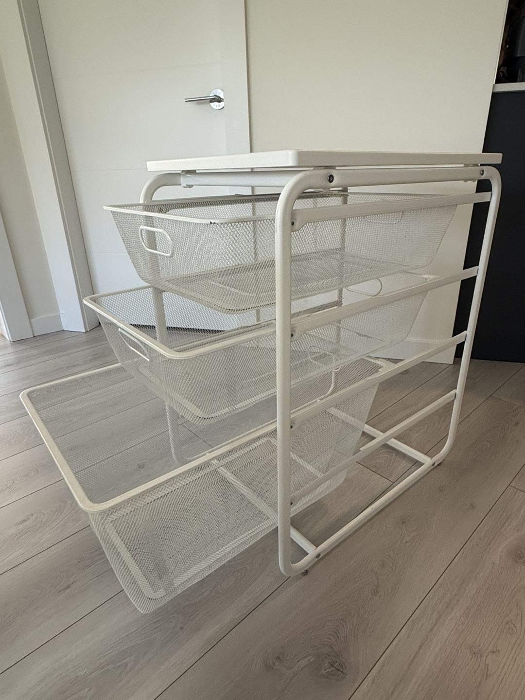 IKEA White Wire Storage Unit with three wire baskets