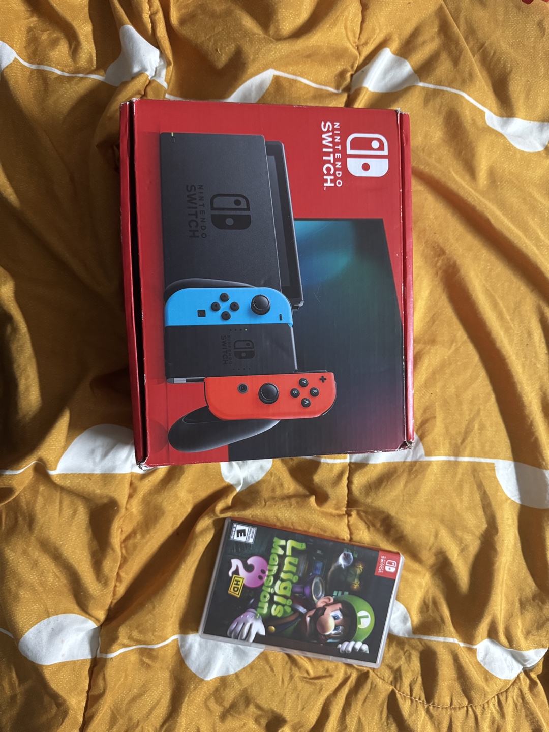 Nintendo Switch with Luigi's Mansion 2 and 2 extra Joy-cons