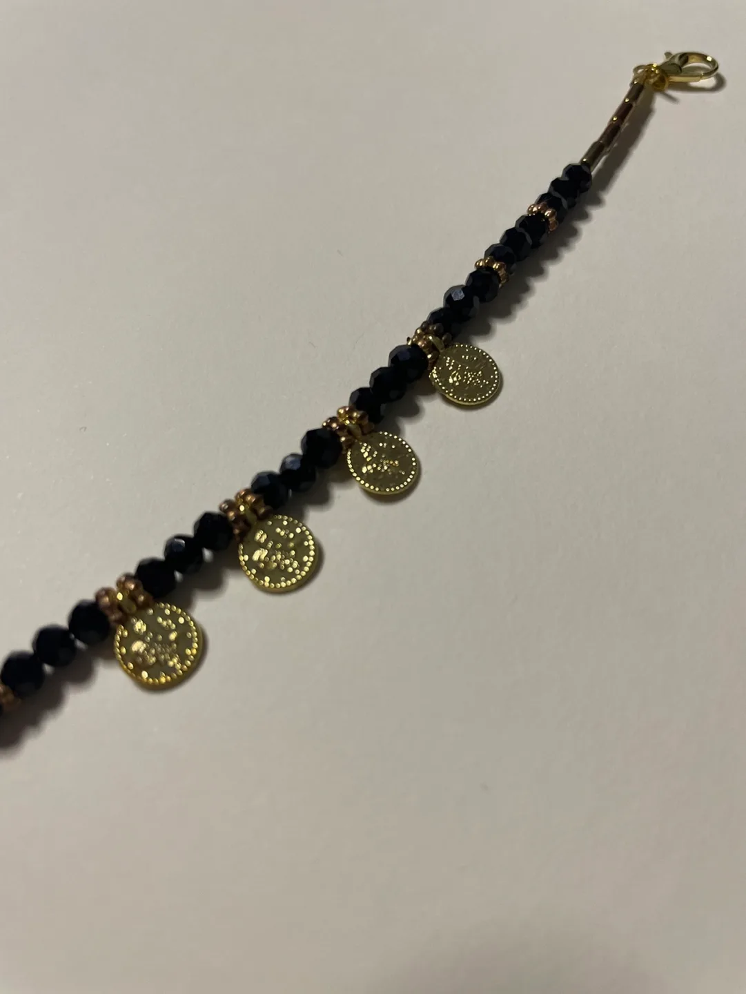 Black Beaded Bracelet with Gold Coin Charms image indicator(2)