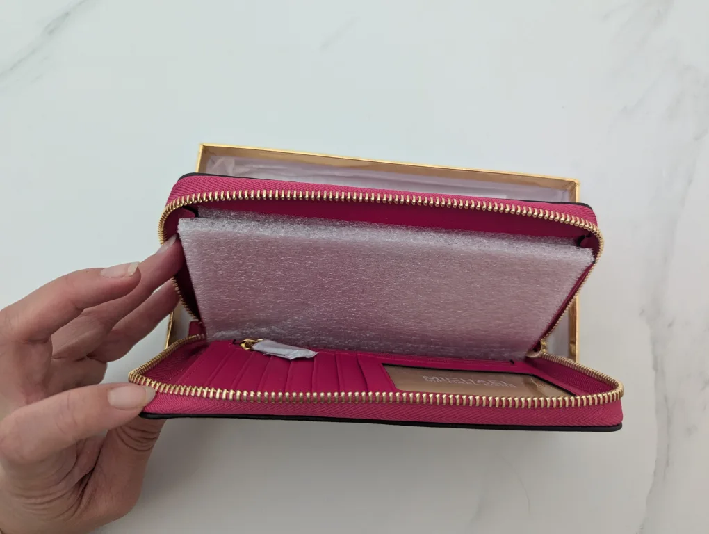 Pink Michael Kors gold Stars cutout Wristlet wallet image indicator(2)
