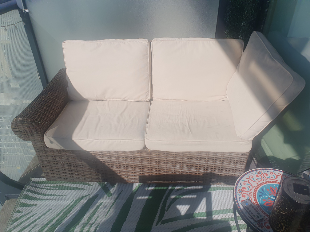 Wicker Patio Sofa with cover.