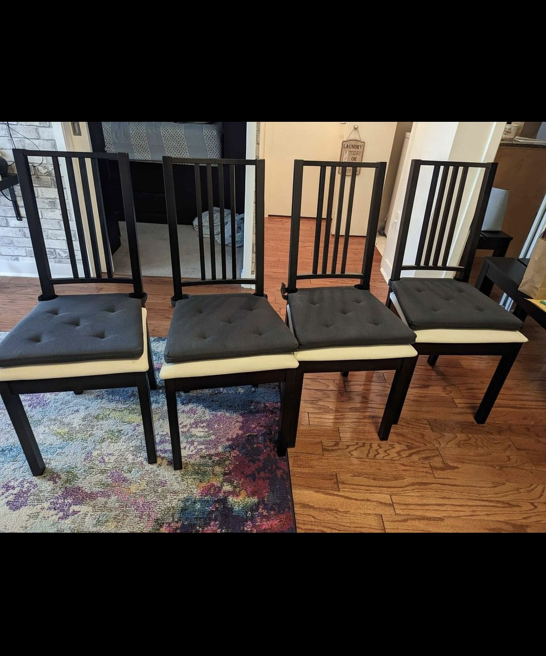 Black Extendable Dining Table and Four Chairs
