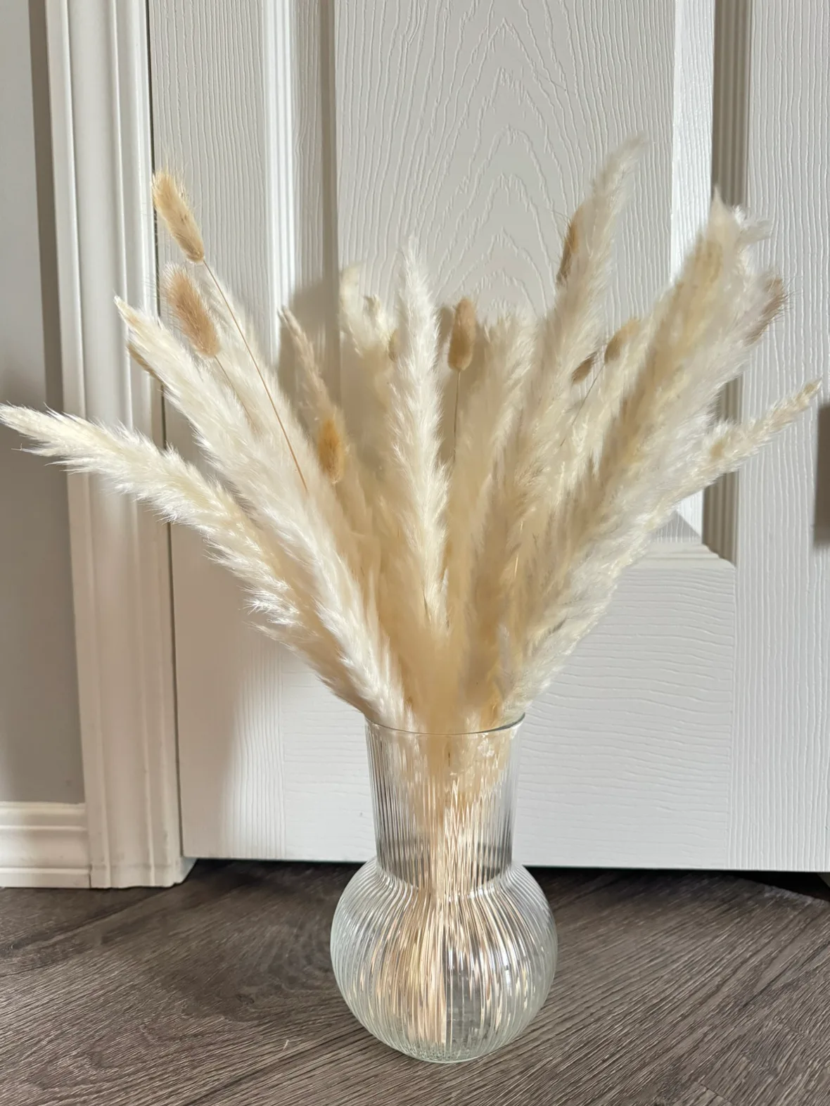 Very fluffy All white Pampas arrangement with glass vase thumbnail