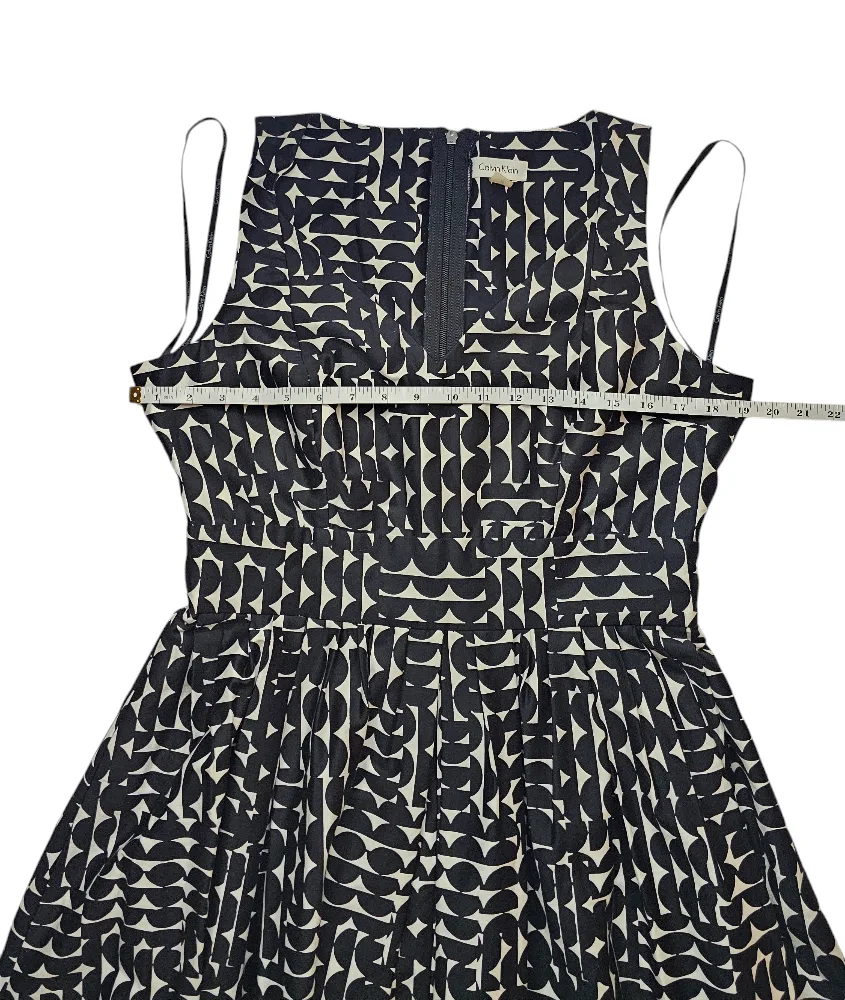 Calvin Klein Black and White Geometric Print Fit and Flare Dress image indicator(6)