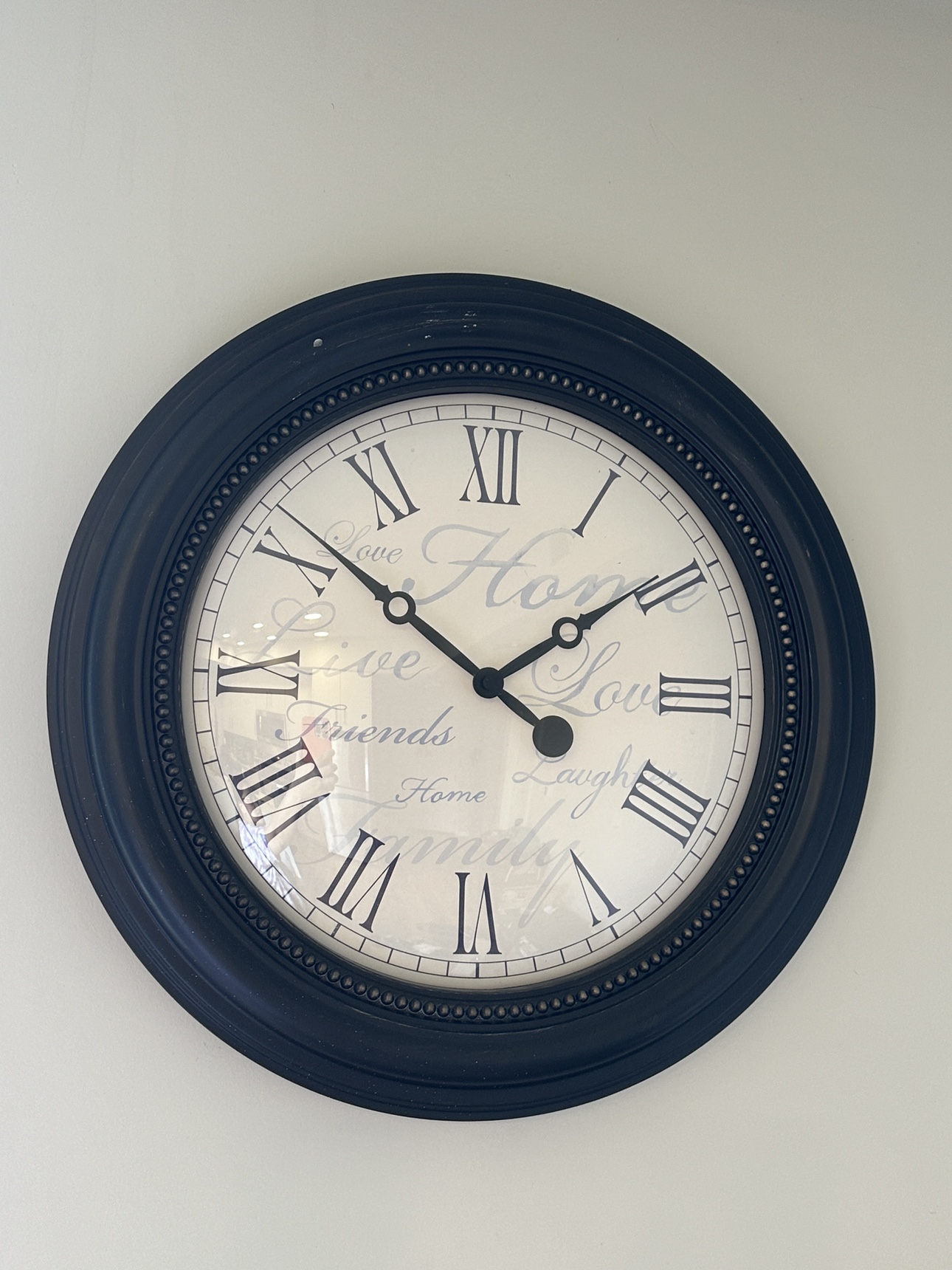 Black Wall Clock with Roman Numerals