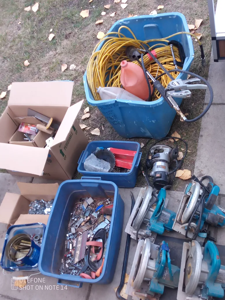 Assortment of tools and hardware