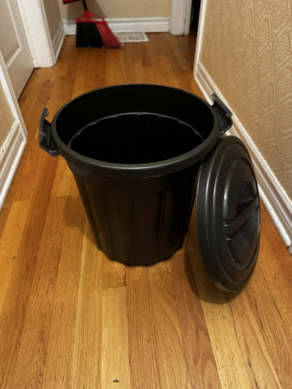 Black Plastic Garbage Can with Lid