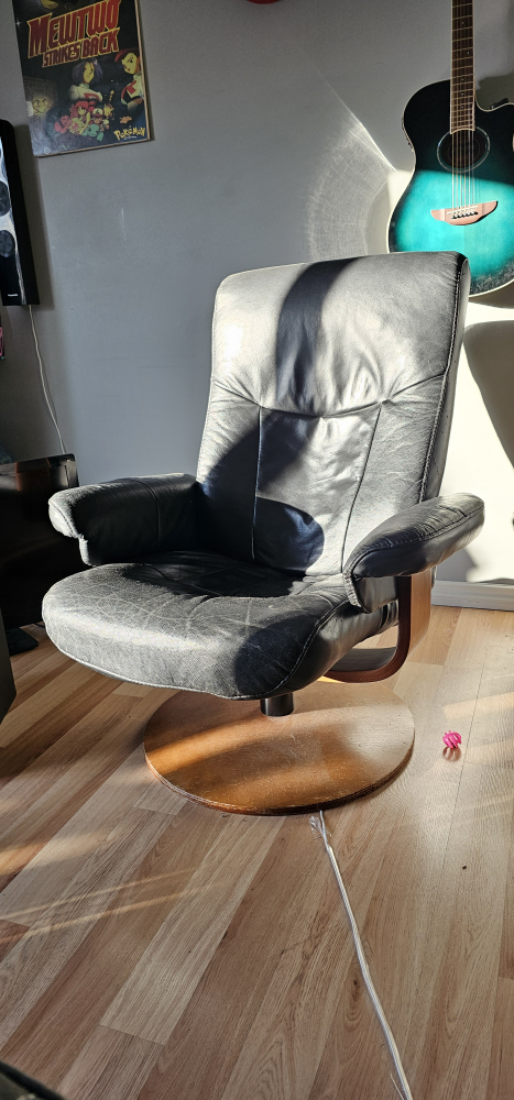 Leather chair with wooden base