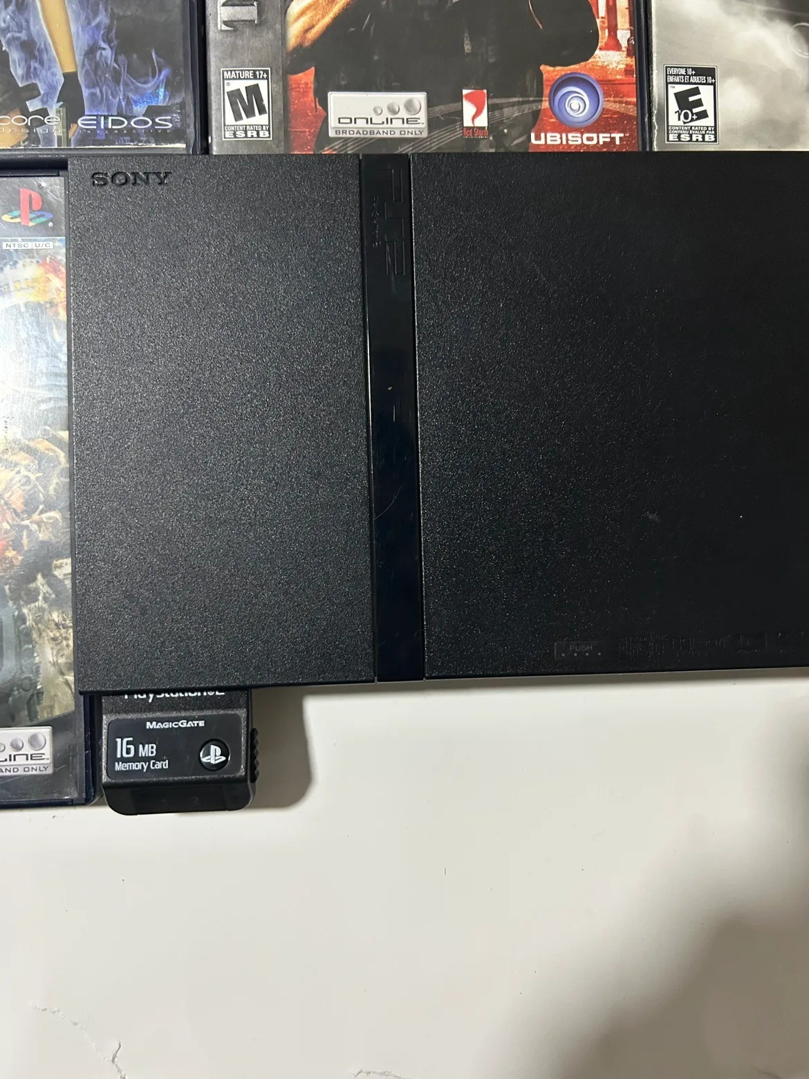 Sony PS2 slim Console with 5 games image indicator(2)