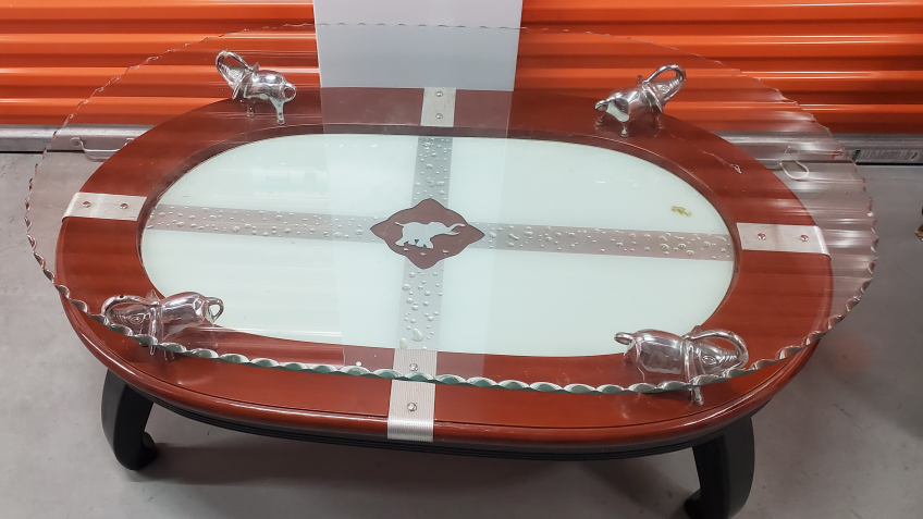 Glass Top Coffee Table with Elephant Accents
