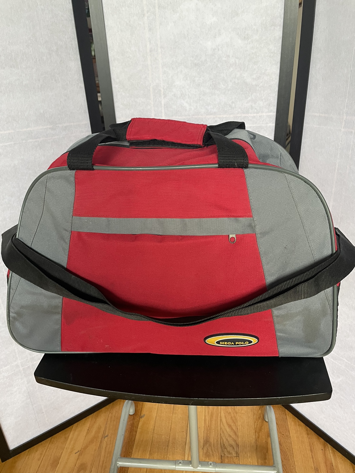 Red and Grey Rolling Duffle Bag