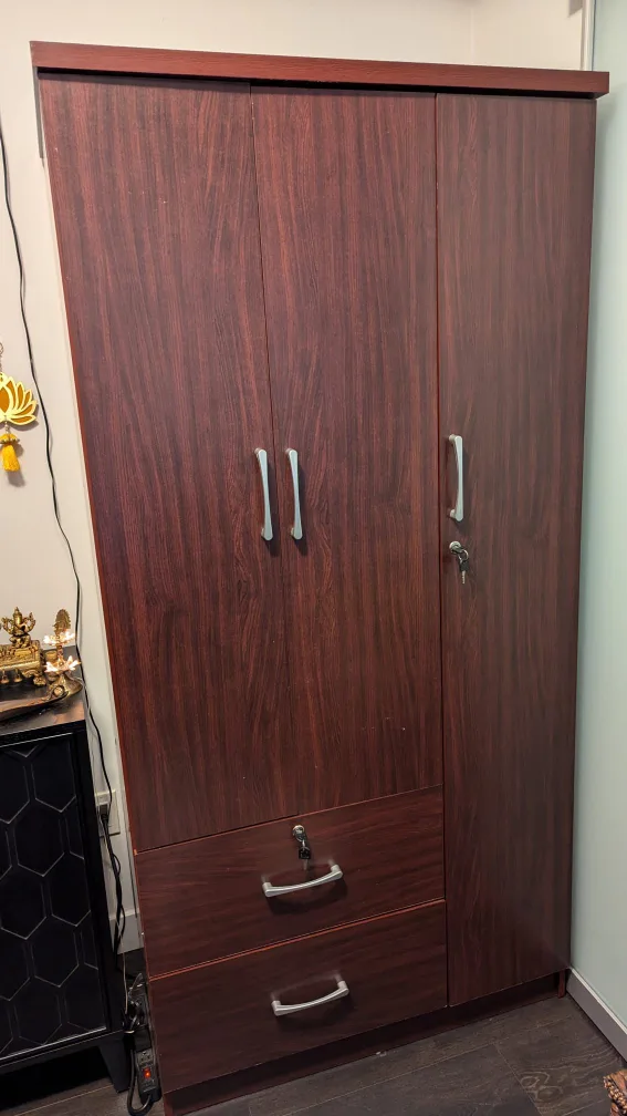 Three Door Wooden Armoire with Drawers thumbnail