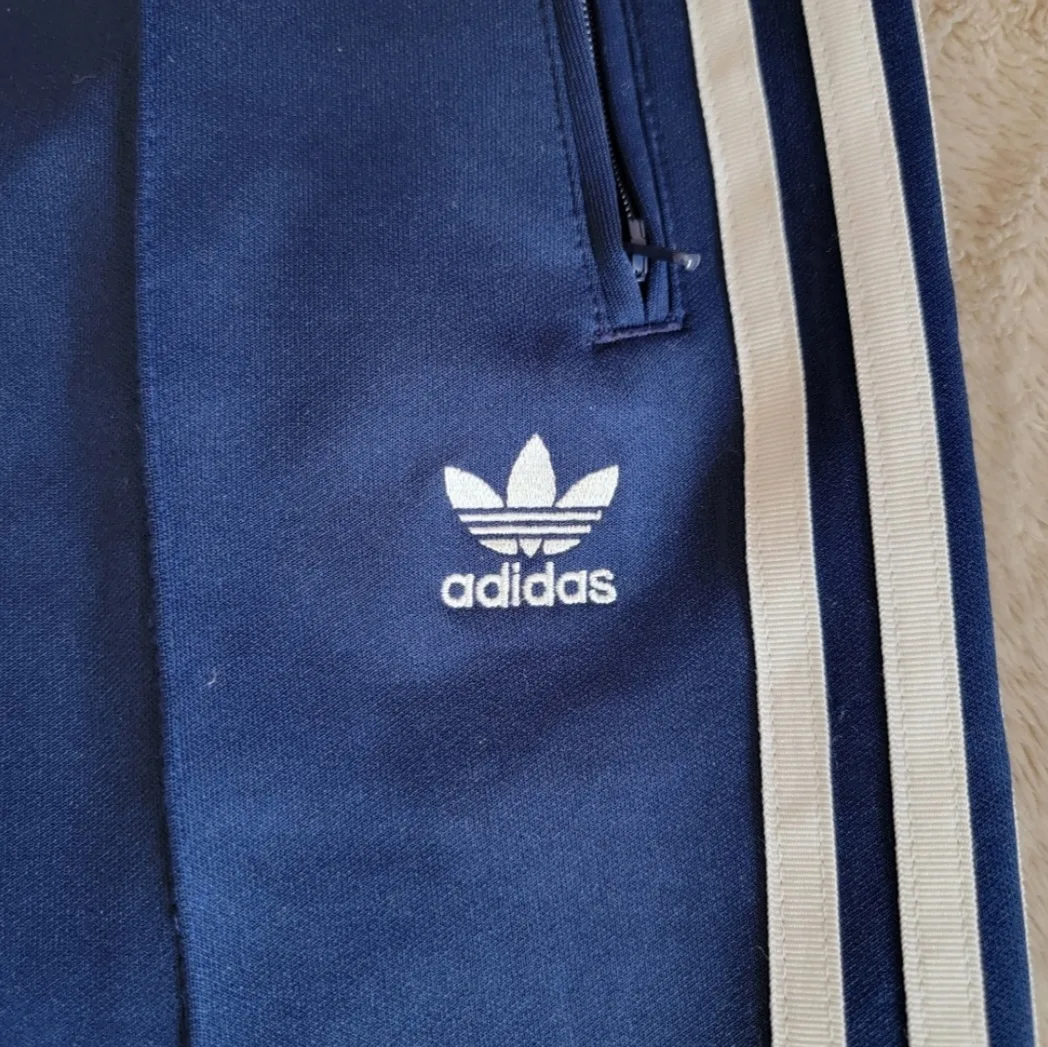 Adidas tapered blue track pants image indicator(3)