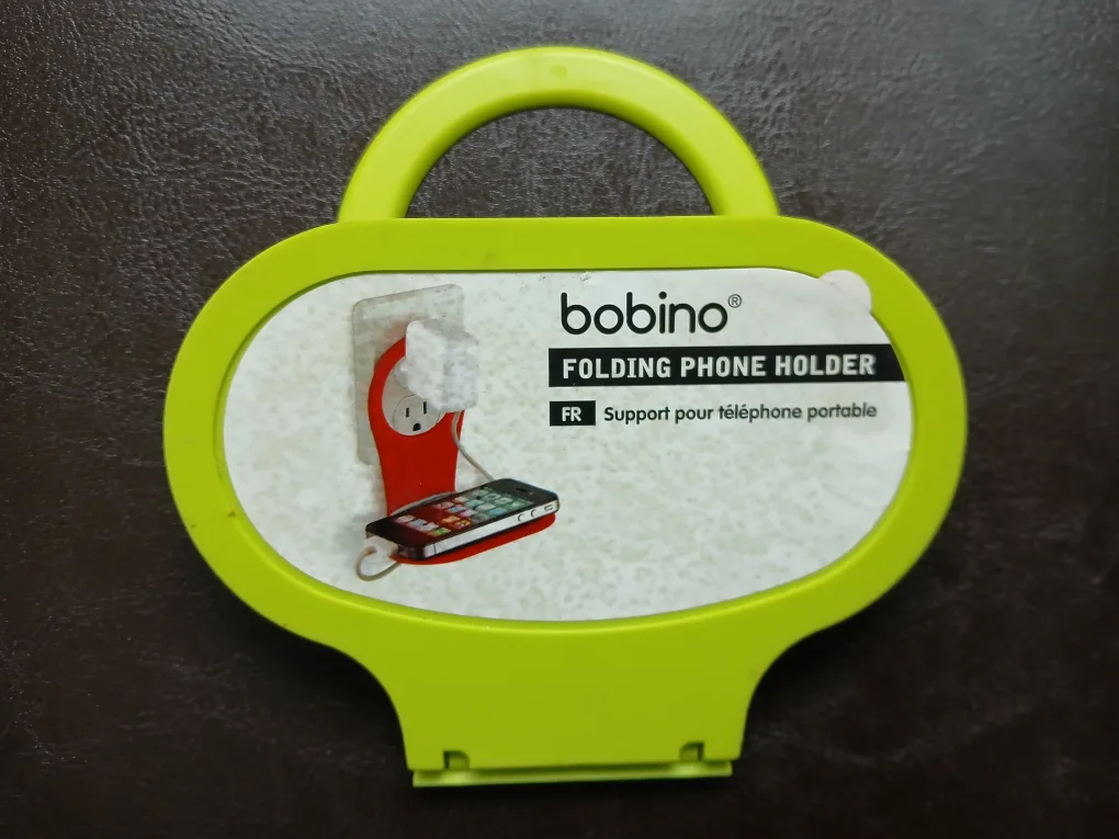 2 Elephant Phone Holders. 1 Bobino Phone Holder. All $8. FIRM. image indicator(2)