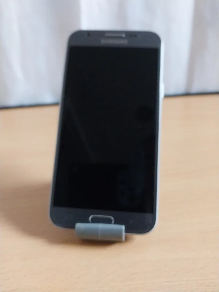 2 Elephant Phone Holders. 1 Bobino Phone Holder. All $8. FIRM. image indicator(4)