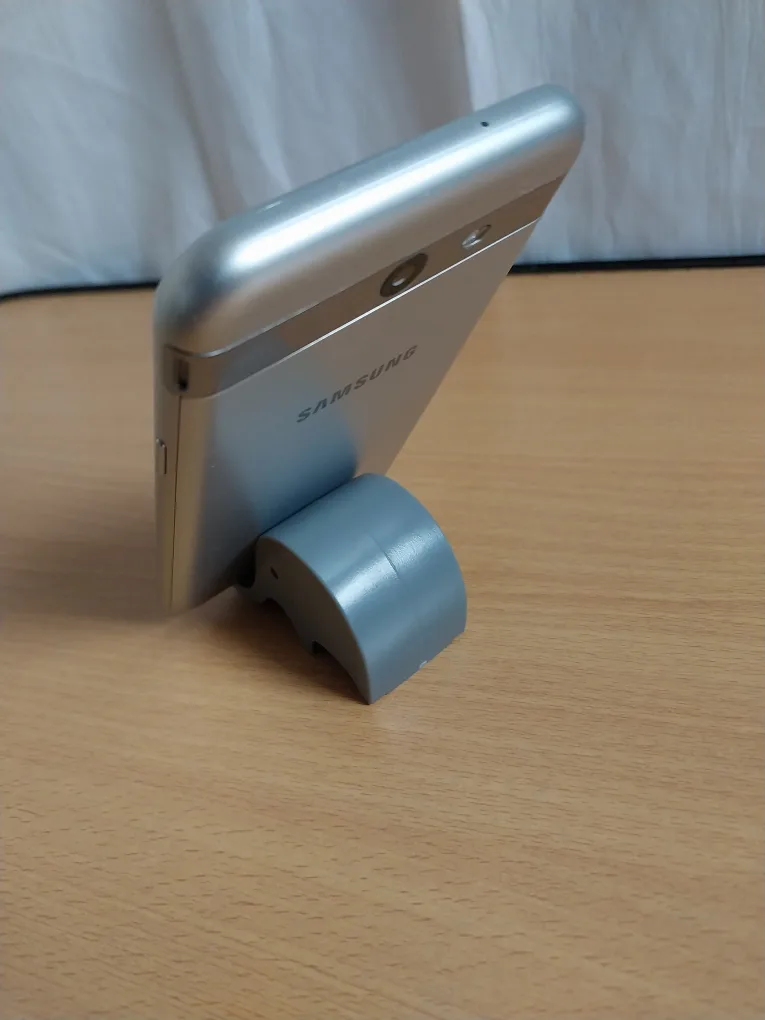 2 Elephant Phone Holders. 1 Bobino Phone Holder. All $8. FIRM. image indicator(5)