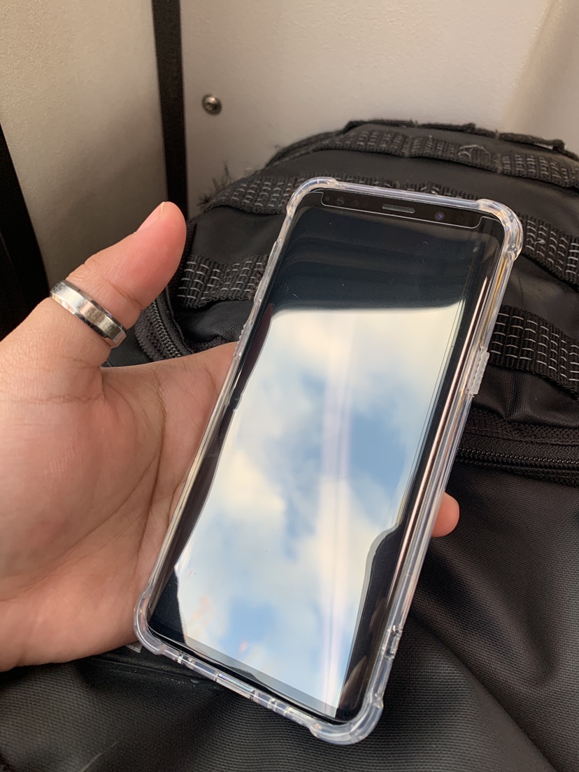 Samsung Galaxy S9+ with case and screen protector