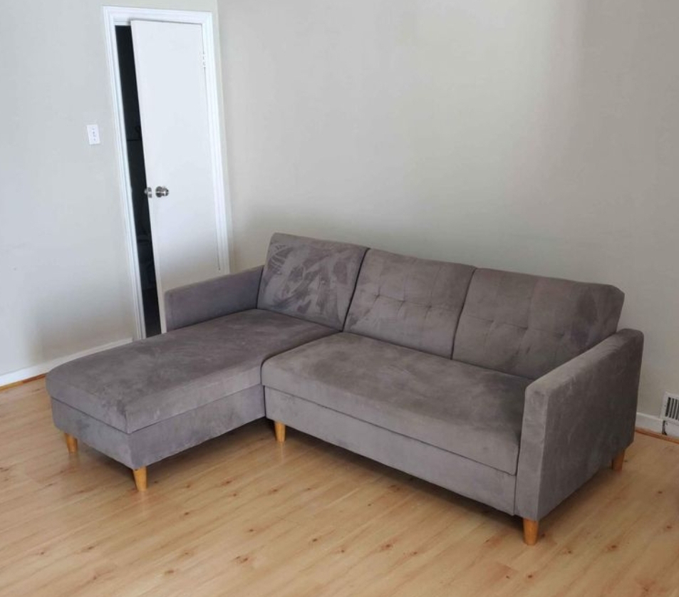 Dark grey reversible sleeper sectional sofa with storage