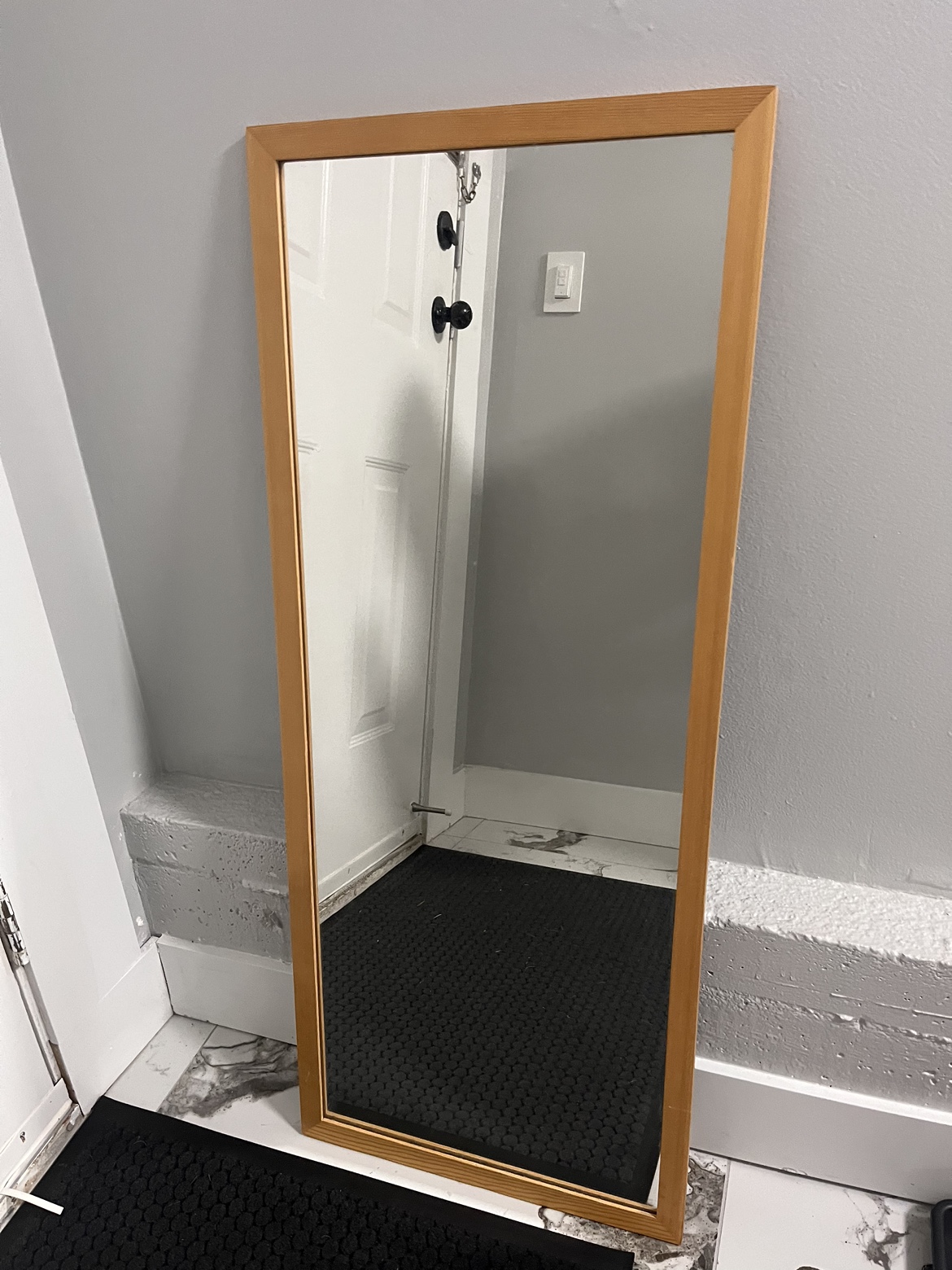 Full-length IKEA mirror with wooden frame