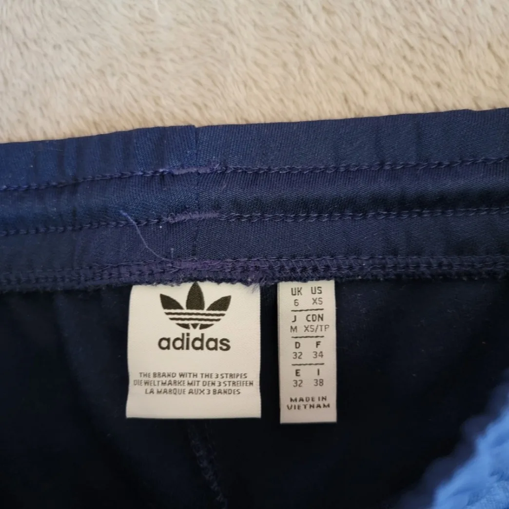 Adidas tapered blue track pants image indicator(7)