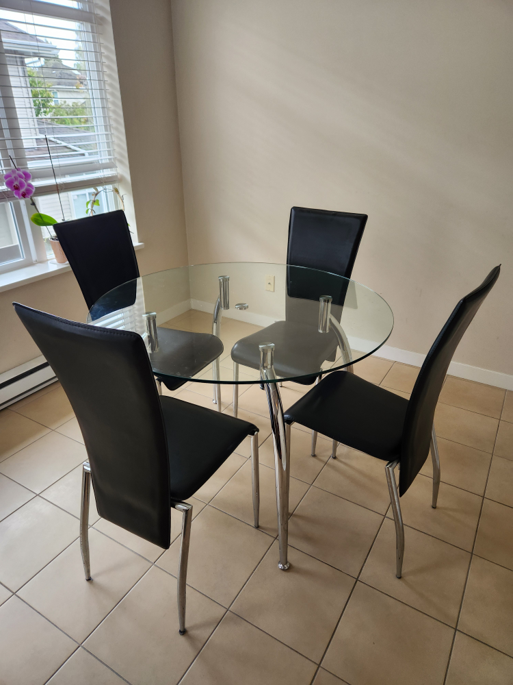 Moving sale!!! Glass dining table and four chairs