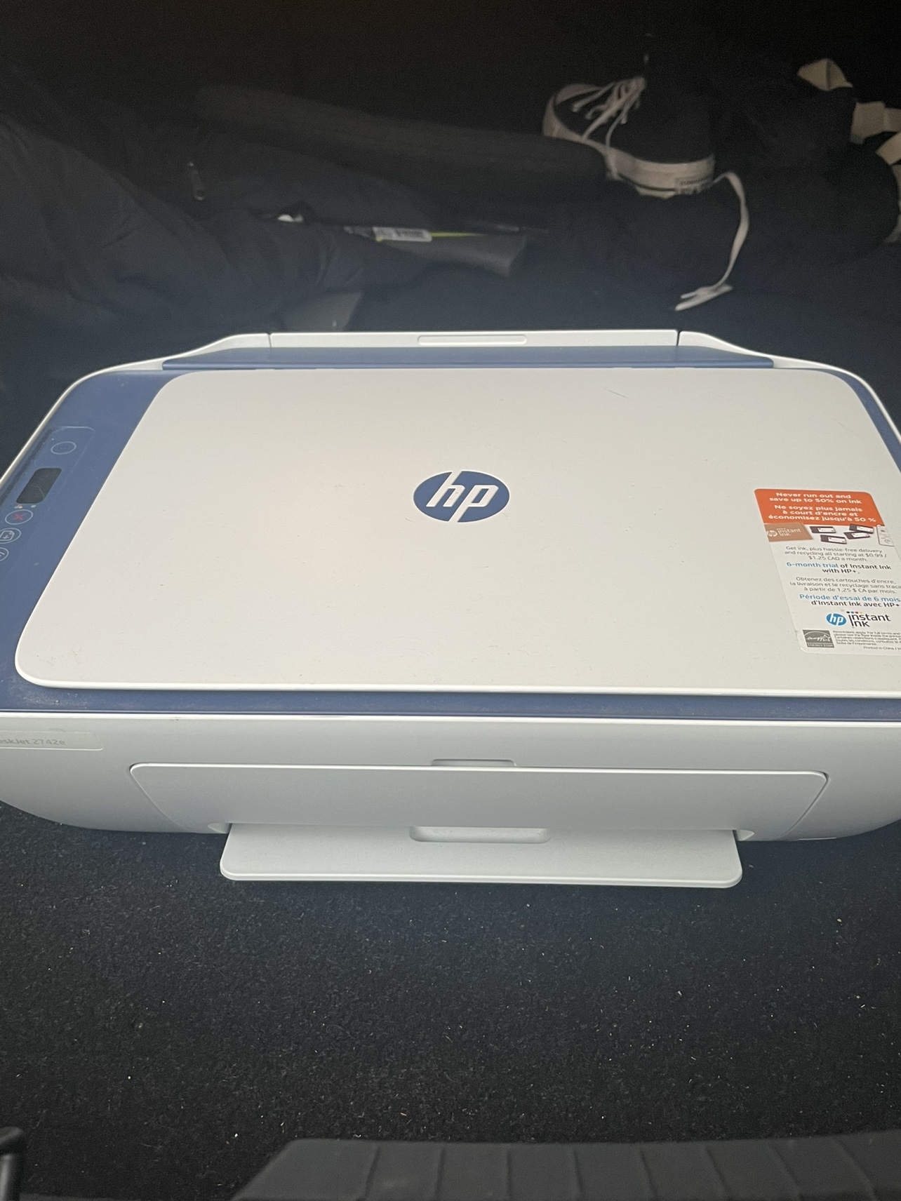 HP DeskJet 2742e All-in-One Printer, ink, and printer paper. - photo 2