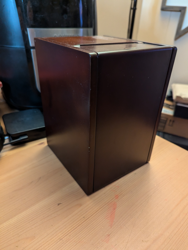 wooden box that used to have photo albums in it