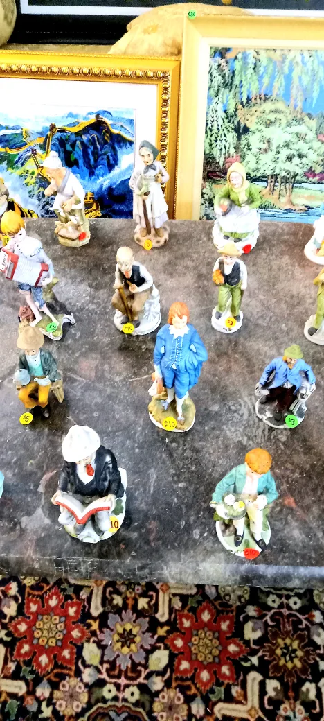 many antique porcelain figurines, statues on sale, $5, $10, $15. image indicator(2)