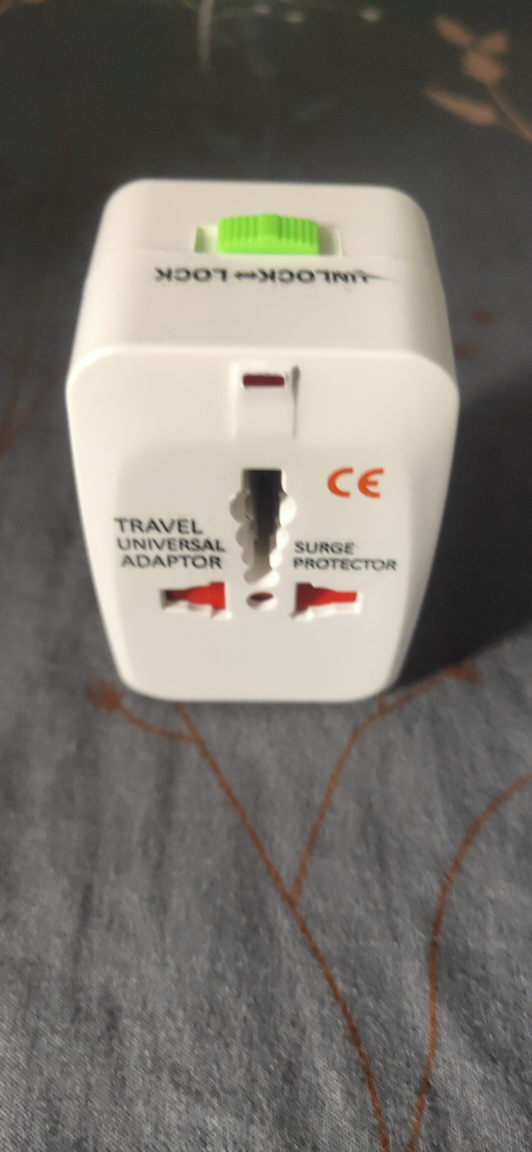 Universal Travel Adaptor with Surge Protector - photo 2