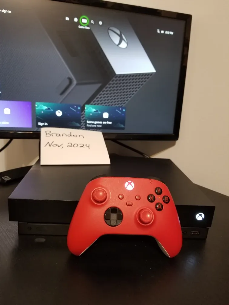 Xbox One X 1TB 4k. With cables, new controller, box. MINT. thumbnail